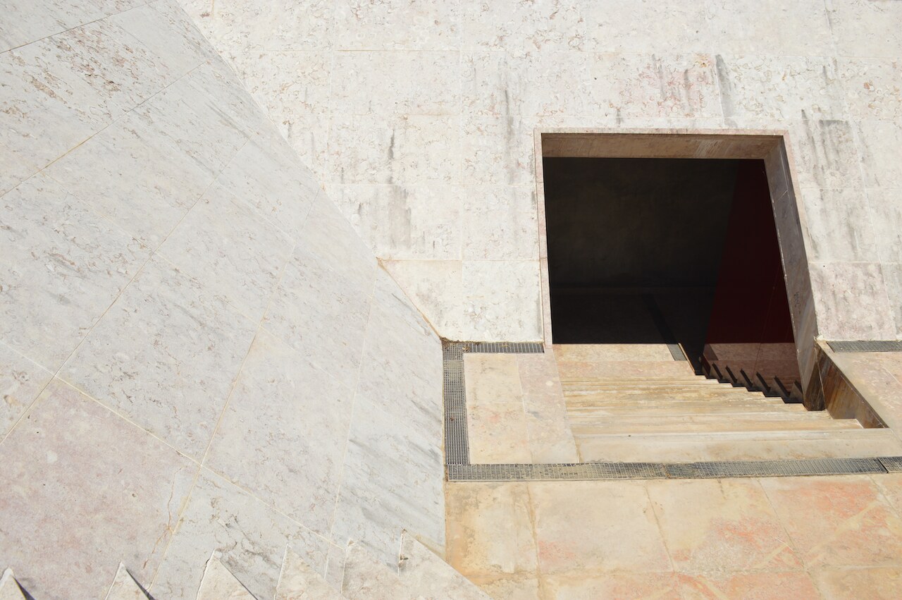 The marble staircase descending into the ODE cellar.