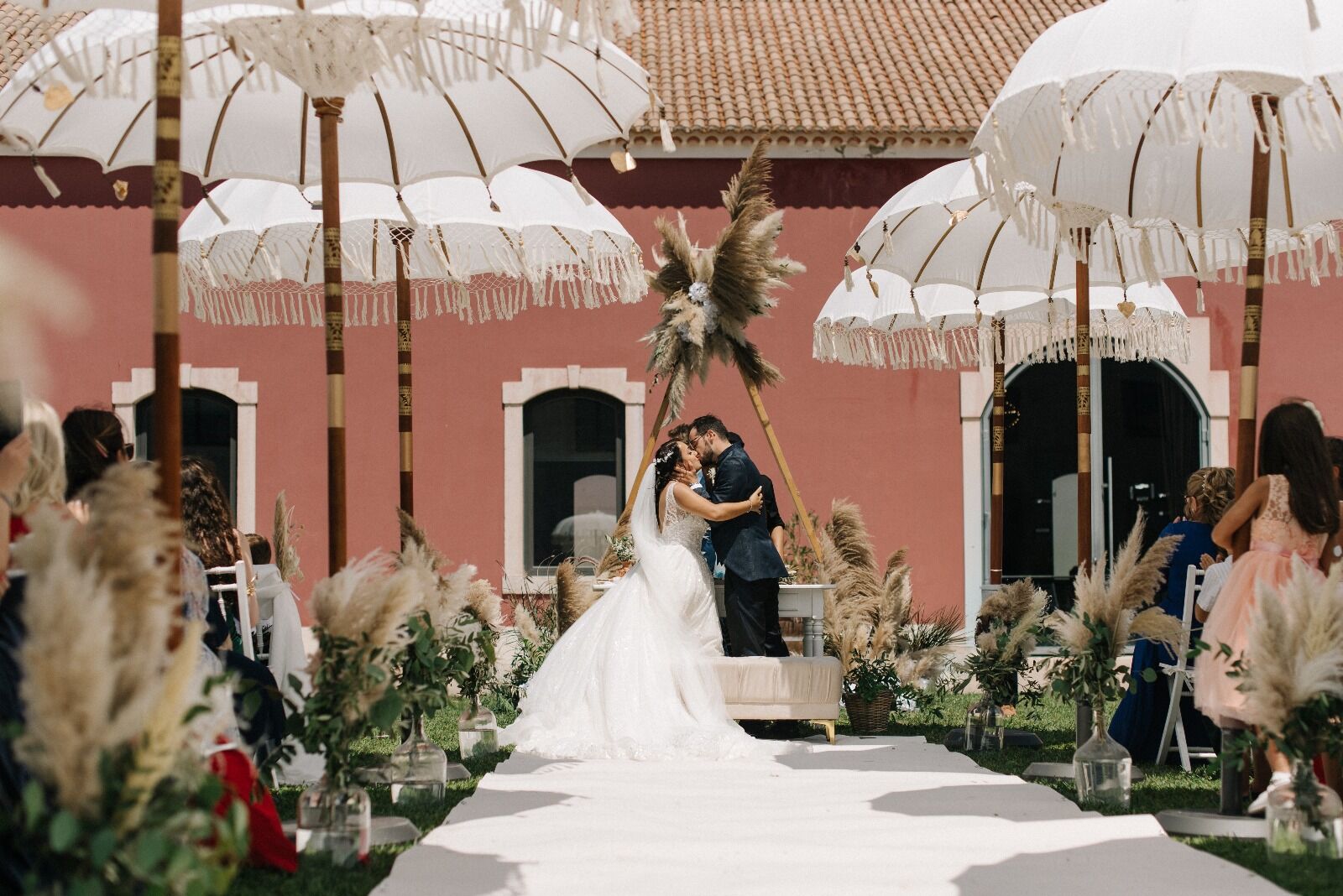 A wedding aisle set in the fountain courtyard at Ode.
